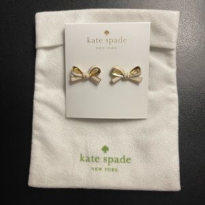 Kate Spade “Skinny Mini” Stud Earrings in white & gold.